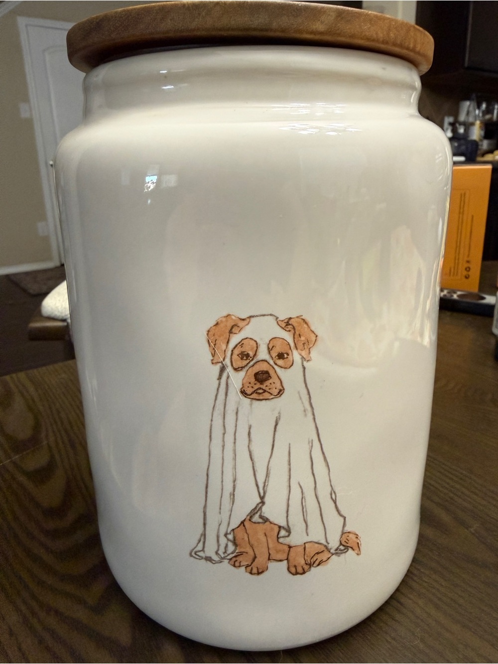 Rae Dunn White Ceramic Halloween Dog Treat Canister with Woodgrain Lid.